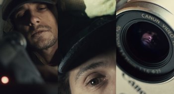 Movie still from “127 Hours” (2010), directed by Danny Boyle – A series of three photos of a man with a hat on and a camera; Extreme Close Up shot, Overhead angle