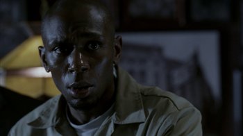 Movie still from “16 Blocks” (2006), directed by Richard Donner – A person wearing a jacket; Close Up shot, Low angle