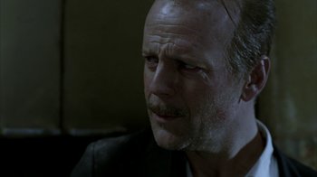 Movie still from “16 Blocks” (2006), directed by Richard Donner – A person wearing a jacket; Close Up shot, Over the shoulder angle