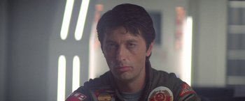 Movie still from “2010: The Year We Make Contact” (1984), directed by Peter Hyams – A person wearing a jacket; Close Up shot, Low angle