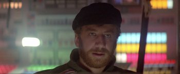 Movie still from “2010: The Year We Make Contact” (1984), directed by Peter Hyams – A person wearing a hat; Close Up shot, Low angle