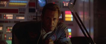 Movie still from “2010: The Year We Make Contact” (1984), directed by Peter Hyams – A person wearing a jacket; Medium shot, Low angle