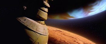 Movie still from “2010: The Year We Make Contact” (1984), directed by Peter Hyams – A view of a space station from a space ship; Extreme Wide shot, Low angle