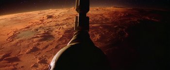 Movie still from “2010: The Year We Make Contact” (1984), directed by Peter Hyams – A view of the earth from a space station window; Extreme Wide shot, Low angle