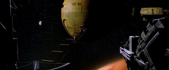 Movie still from “2010: The Year We Make Contact” (1984), directed by Peter Hyams – A yellow hot air balloon floating in the sky; Extreme Wide shot, Low angle
