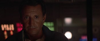 Movie still from “2010: The Year We Make Contact” (1984), directed by Peter Hyams – A person wearing a jacket; Close Up shot, Low angle