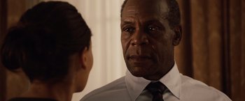 Movie still from “2012” (2009), directed by Roland Emmerich – A man and a woman are talking to each other; Close Up shot, Over the shoulder angle