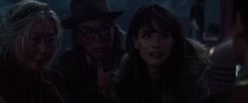 Movie still from “2012” (2009), directed by Roland Emmerich – A man and a woman looking at the camera; Close Up shot, Over the shoulder angle