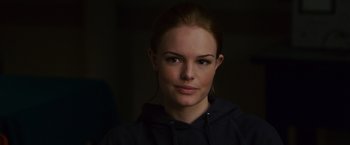 Movie still from “21” (2008), directed by Robert Luketic – A person wearing a hooded sweatshirt; Close Up shot, Over the shoulder angle