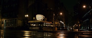 Movie still from “21” (2008), directed by Robert Luketic – A coffee shop on the side of the street at night; Extreme Wide shot, High angle