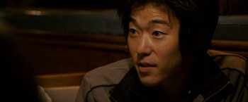 Movie still from “21” (2008), directed by Robert Luketic – A person wearing a jacket; Close Up shot, High angle