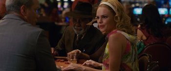 Movie still from “21” (2008), directed by Robert Luketic – A man and a woman sitting at a table; Medium shot, Over the shoulder angle