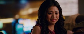 Movie still from “21” (2008), directed by Robert Luketic – A person with long black hair; Close Up shot, Over the shoulder angle