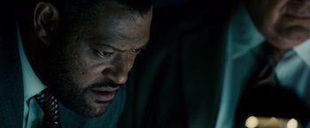 Movie still from “21” (2008), directed by Robert Luketic – A person looking at a computer screen; Close Up shot, Low angle