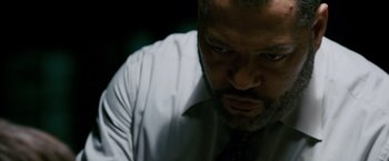 Movie still from “21” (2008), directed by Robert Luketic – A person wearing a shirt and tie; Close Up shot, Low angle