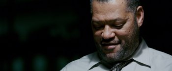 Movie still from “21” (2008), directed by Robert Luketic – A person wearing a shirt and a tie; Close Up shot, Over the shoulder angle