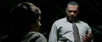 Movie still from “21” (2008), directed by Robert Luketic – A man and a young boy talking to each other; Close Up shot, Over the shoulder angle