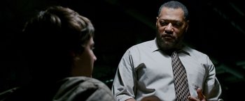 Movie still from “21” (2008), directed by Robert Luketic – A man and a boy are talking to each other; Medium shot, Over the shoulder angle