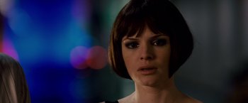 Movie still from “21” (2008), directed by Robert Luketic – A person with short brown hair; Close Up shot, Over the shoulder angle