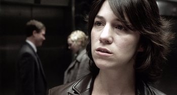 Movie still from “21 Grams” (2003), directed by Alejandro G. Iñárritu – A person wearing a leather jacket; Close Up shot, Over the shoulder angle