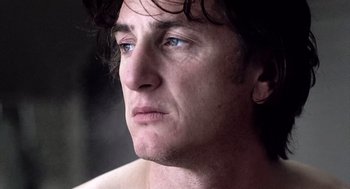 Movie still from “21 Grams” (2003), directed by Alejandro G. Iñárritu – A person with blue eyes; Close Up shot, Low angle