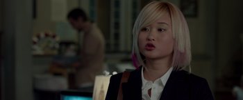 Movie still from “21 Jump Street” (2012), directed by Phil Lord – A young woman with blonde hair and a pink pony tail; Close Up shot, Over the shoulder angle