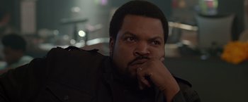 Movie still from “21 Jump Street” (2012), directed by Phil Lord – A person with his hand on his chin; Close Up shot, Over the shoulder angle