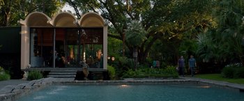 Movie still from “21 Jump Street” (2012), directed by Phil Lord – A gazebo with a gazebo in the middle of a pool; Extreme Wide shot, High angle