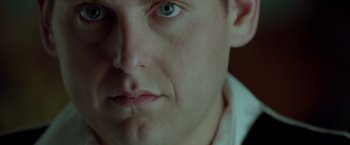 Movie still from “21 Jump Street” (2012), directed by Phil Lord – A man's face with a blue eye; Close Up shot, Low angle