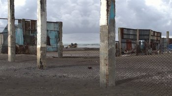 Movie still from “24 Frames” (2017), directed by Abbas Kiarostami – A view of the ocean from the beach; Extreme Wide shot, Low angle