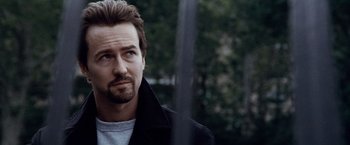 Movie still from “25th Hour” (2002), directed by Spike Lee – A person wearing a jacket; Close Up shot, Low angle