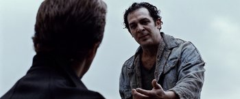 Movie still from “25th Hour” (2002), directed by Spike Lee – A man talking to another man in front of a mirror; Close Up shot, Over the shoulder angle