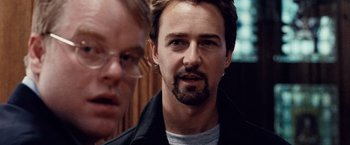 Movie still from “25th Hour” (2002), directed by Spike Lee – A person with a beard; Close Up shot, Over the shoulder angle