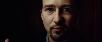 Movie still from “25th Hour” (2002), directed by Spike Lee – A person with a beard; Close Up shot, Low angle