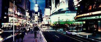 Movie still from “25th Hour” (2002), directed by Spike Lee – A city street with a lot of cars on the road; Extreme Wide shot, High angle