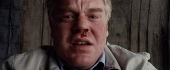 Movie still from “25th Hour” (2002), directed by Spike Lee – A person with a nose bleed; Close Up shot, Overhead angle