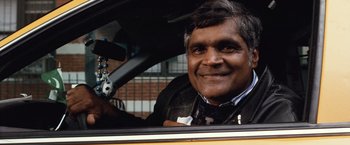 Movie still from “25th Hour” (2002), directed by Spike Lee – A man sitting in the driver's seat of a car; Close Up shot, Over the shoulder angle
