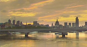 Movie still from “28 Days Later” (2002), directed by Danny Boyle – A view of a city skyline from across a river; Extreme Wide shot, Low angle