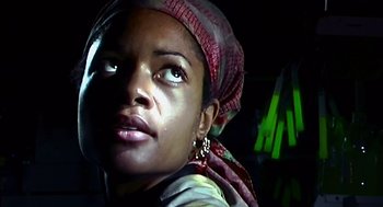 Movie still from “28 Days Later” (2002), directed by Danny Boyle – A person wearing a headscarf; Close Up shot, Low angle