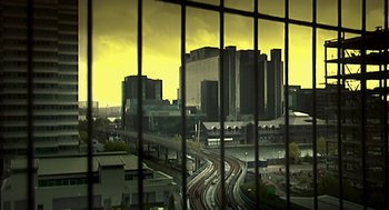 Movie still from “28 Days Later” (2002), directed by Danny Boyle – A view of a city from a window looking outside; Extreme Wide shot, Low angle