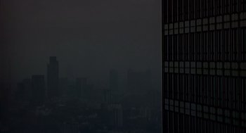 Movie still from “28 Days Later” (2002), directed by Danny Boyle – A view of a city skyline from a building; Extreme Wide shot, Low angle