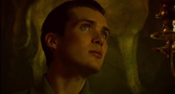 Movie still from “28 Days Later” (2002), directed by Danny Boyle – A young man looking up into the sky; Close Up shot, Low angle