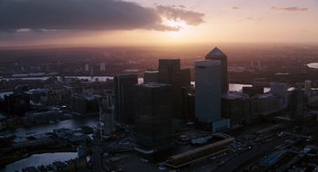 Movie still from “28 Weeks Later” (2007), directed by Juan Carlos Fresnadillo – An aerial view of a city skyline at sunset; Extreme Wide shot, High angle