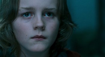 Movie still from “28 Weeks Later” (2007), directed by Juan Carlos Fresnadillo – A person with blue eyes; Close Up shot, Low angle