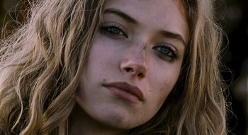 Movie still from “28 Weeks Later” (2007), directed by Juan Carlos Fresnadillo – A woman's face with blue eyes; Close Up shot, Low angle