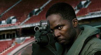 Movie still from “28 Weeks Later” (2007), directed by Juan Carlos Fresnadillo – A man holding a video camera in front of his face; Close Up shot, Low angle