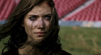 Movie still from “28 Weeks Later” (2007), directed by Juan Carlos Fresnadillo – A person with blue eyes; Close Up shot, Low angle