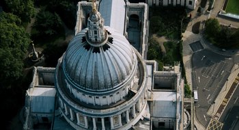 Movie still from “28 Weeks Later” (2007), directed by Juan Carlos Fresnadillo – An aerial view of a building with a dome; Extreme Wide shot, Overhead angle