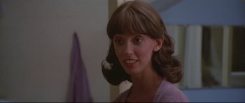 Movie still from “3 Women” (1977), directed by Robert Altman – A person wearing a purple shirt; Close Up shot, Low angle