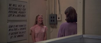 Movie still from “3 Women” (1977), directed by Robert Altman – Two women are talking in a bathroom; Medium shot, Over the shoulder angle